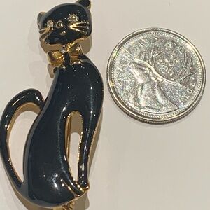 Elegant Black Cat Brooch with Gold Accents